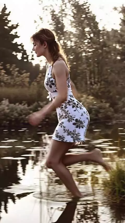 AI Video from prompt: A girl runs into the water and swims