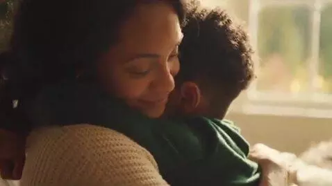 AI Video from prompt: Mom and son hugging
