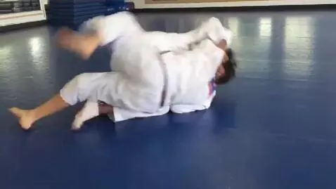 AI Video from prompt: two boys at six years,wearing bjj jackets,white 