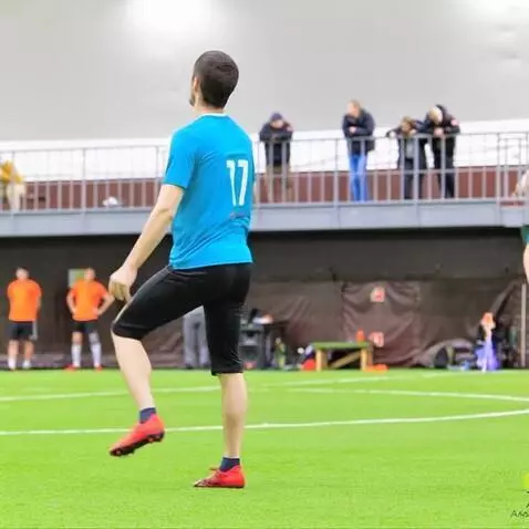 AI Video from prompt: This man kicks the ball, but misses and falls, s