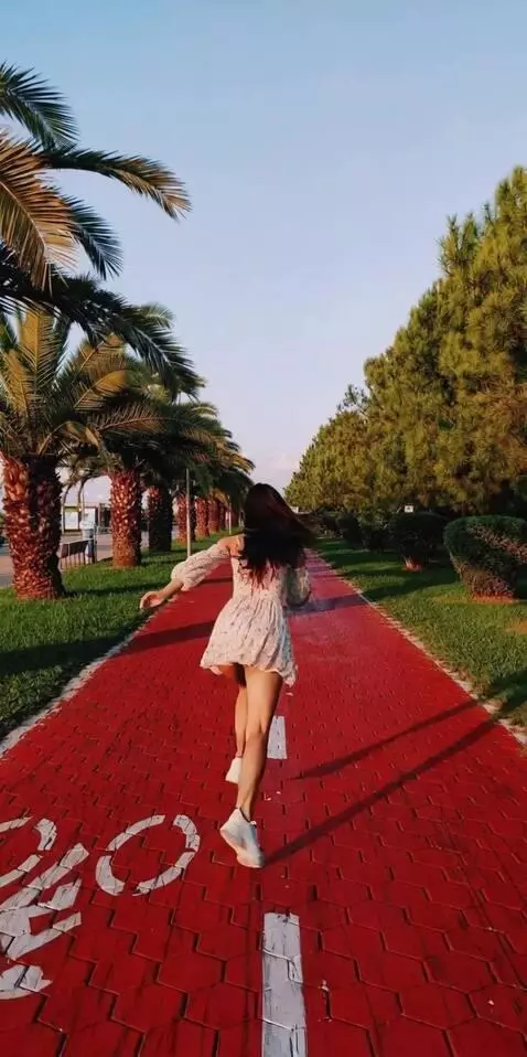AI Video from prompt: The girl turns, waves her hand, as if signaling 