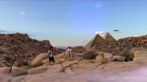 AI Video from prompt: the 2 musicians play middle eastern music in fro