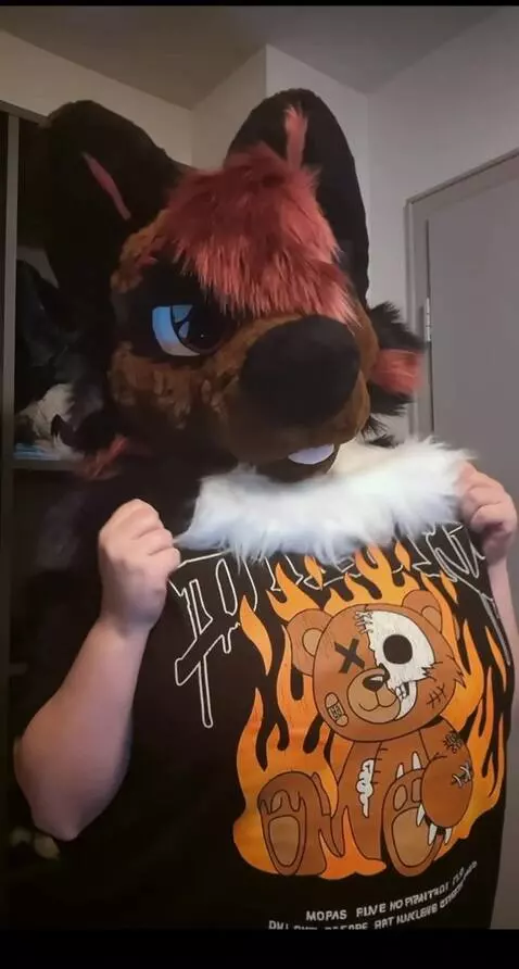 AI Video from prompt: Furry girl's chest growing huge till they fill t