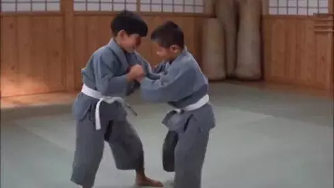 AI Video from prompt: two boys at six years,wearing kurashi jackets,wh
