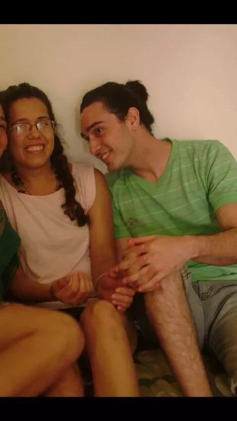 AI Video from prompt: The boyfriend of the man hugs them
