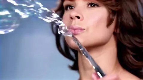 AI Video from prompt: blowing bubbles with wand
