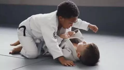 AI Video from prompt: two boys at six years,wearing bjj jackets,white 