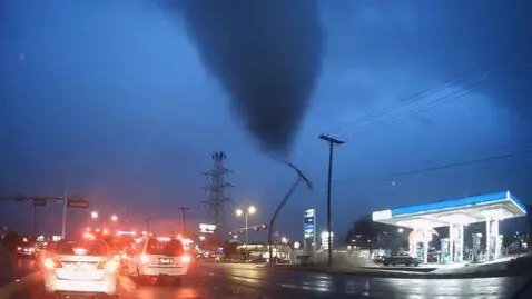 AI Video from prompt: Tornado pulls power line and power line sparking