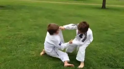 AI Video from prompt: two boys at six years,wearing bjj jackets,white 