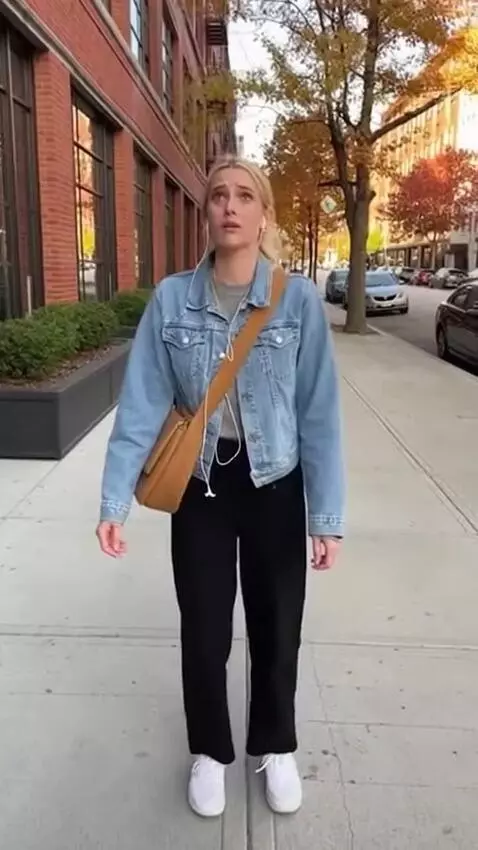 AI Video from prompt: Open on a white woman walking on a sidewalk. She
