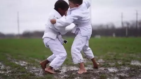 AI Video from prompt: Two boys at six years,wearing bjj jacket,white o