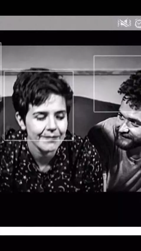 AI Video from prompt: They get up and the man hugs the woman