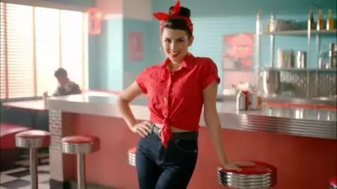AI Video from prompt: 1950s rockabilly girl, she's wearing pin-up styl