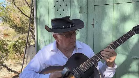 AI Video from prompt: the guitarist plays long legato notes, he is not