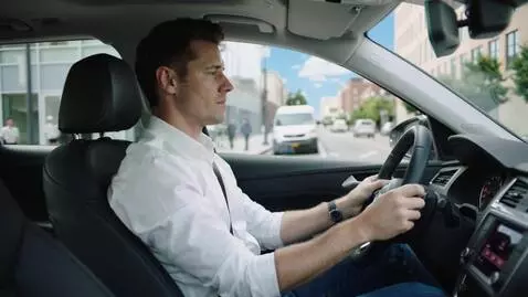 AI Video from prompt: A man is  driving a car