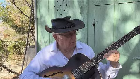 AI Video from prompt: the guitarist plays slow legato notes his right 