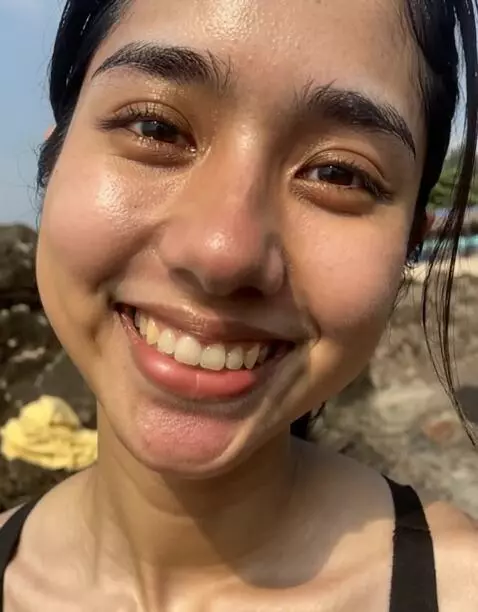 AI Video from prompt: Close ups of her smiling face, front, and back i