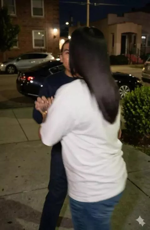 AI Video from prompt: The woman dances with the young man she takes th