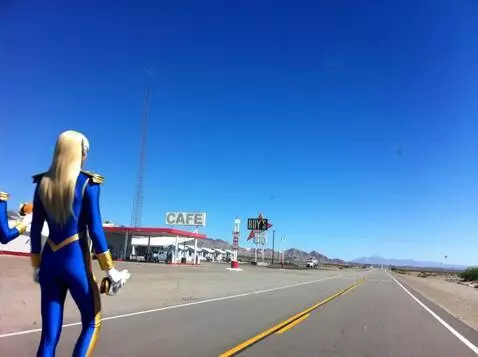AI Video from prompt: 2 Aliens with long blond hair and tight blue fit