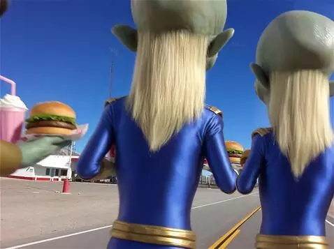 AI Video from prompt: 2 Aliens with long blond hair and tight blue fit
