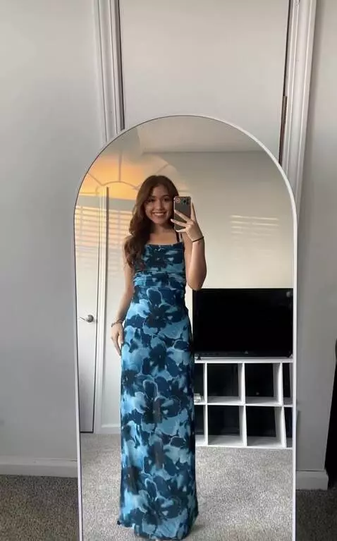 AI Video from prompt: Aqua blue bikini reveal