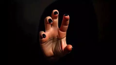 AI Video from prompt: A beautiful young mysterious female hand with na