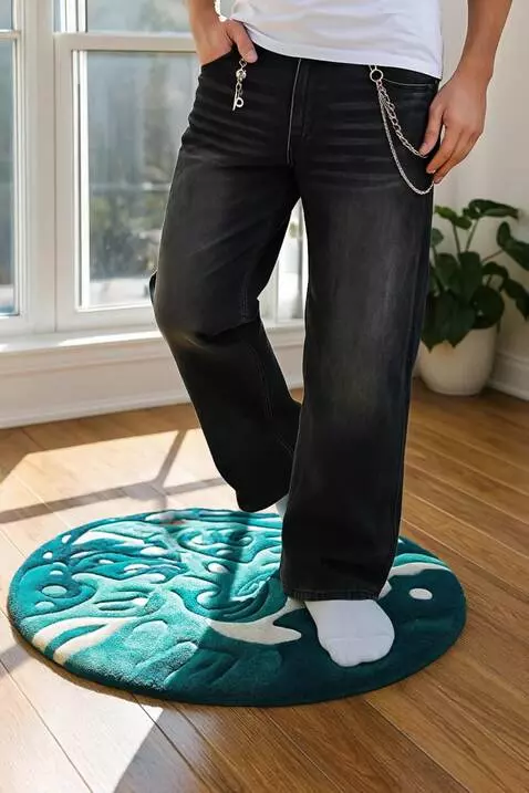 AI Video from prompt: A male model stands casually indoors, illuminate