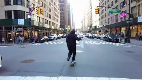 AI Video from prompt: A guy skating through the city