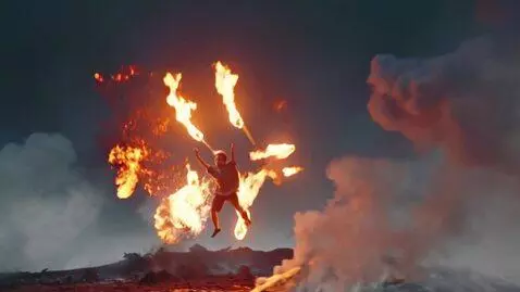 AI Video from prompt: A boy flying in fire