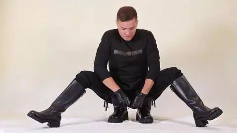 AI Video from prompt: submissive male slave sexy dance Female Dominatr