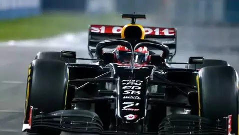 AI Video from prompt: Anime scene of a formula 1 race , a f1 car leadi