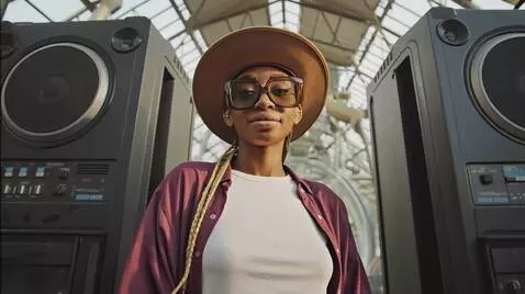 AI Video from prompt: confident closed mouth humble smile, looks direc