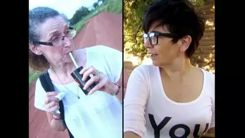 AI Video from prompt: The two women gaze at each other lovingly and em