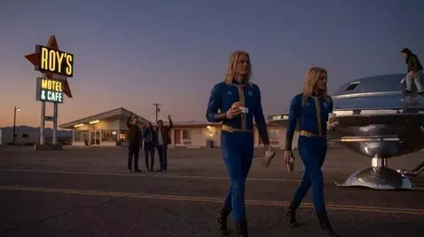 AI Video from prompt: the 2 tall Blonde  Extraterrestrials, one woman 