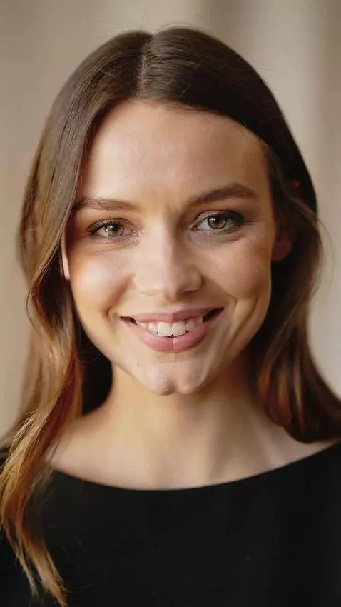 AI Video from prompt: Cinematic shots of her smiling face, front, and 