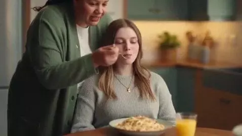 AI Video from prompt: A young woman who starts getting fatter by her m