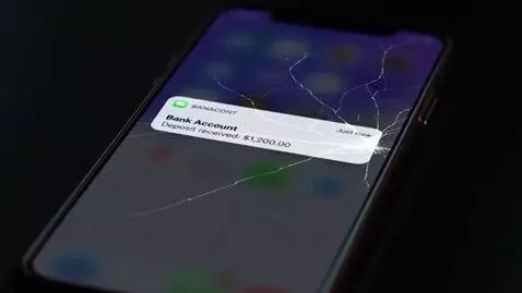 AI Video from prompt: Dark screen. A phone screen glows in the dark. B
