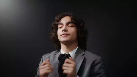 AI Video from prompt: AI Prompt: "Preserve facial identity, natural mo