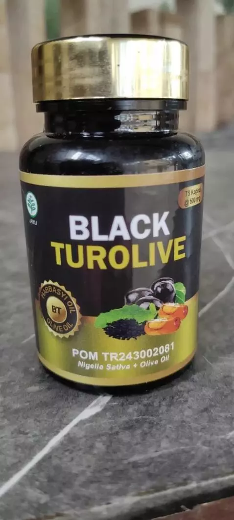 AI Video from prompt: A premium bottle of Black Turolive is positioned