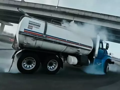 AI Video from prompt: The camera pans to the right. The truck is parke