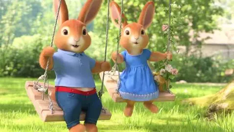 AI Video from prompt: Two cute fluffy light brown mini hares on their 