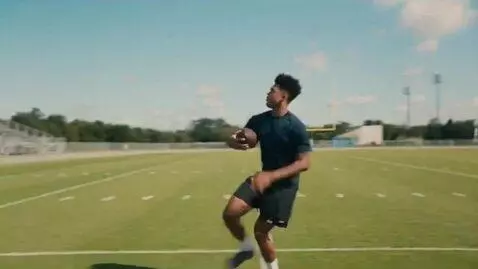AI Video from prompt: A man playing football