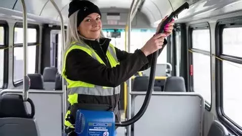 AI Video from prompt: Crystal Adams vacuuming the corners with no crev