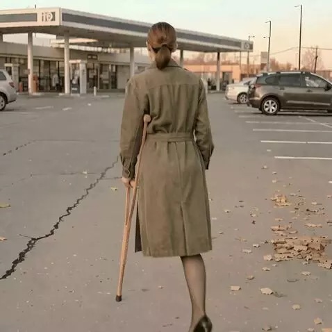 AI Video from prompt: The camera shoots a very beautiful one-legged wo