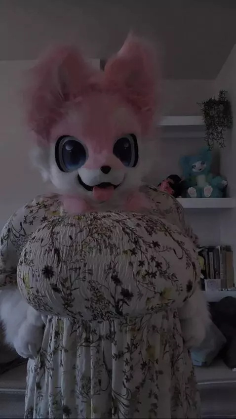 AI Video from prompt: Furry girl bosoms growing like 2 huge overfilled