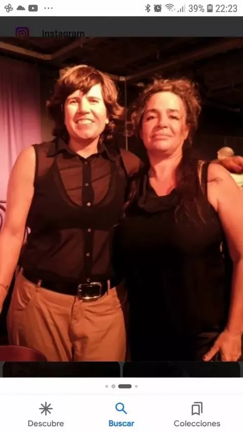 AI Video from prompt: The woman turn aroud and shows off her clothes