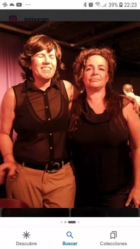 AI Video from prompt: The woman in brown pants turn around and shows o