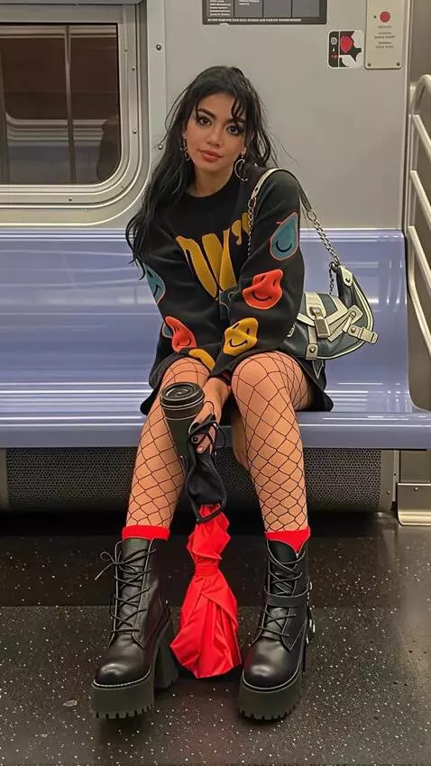 AI Video from prompt: A girl is riding in a subway car, swaying as she