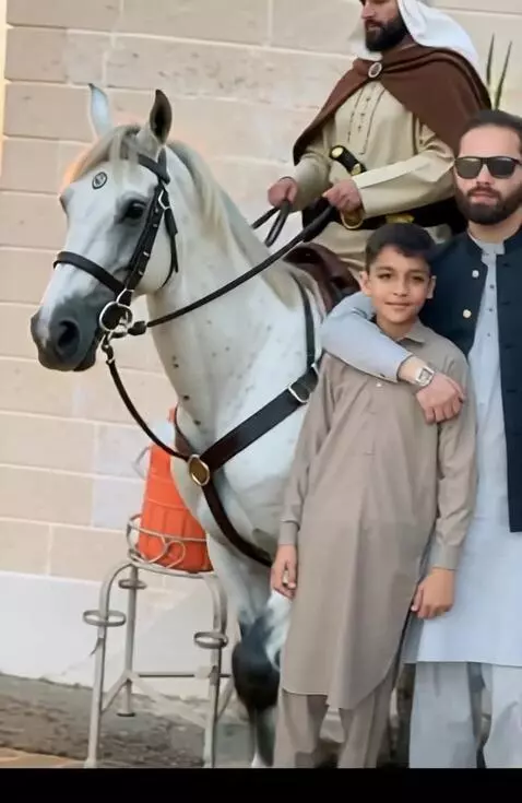 AI Video from prompt: A young Muslim warrior riding a white Arabian ho