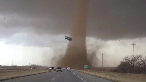AI Video from prompt: Tornado Siren is on and tornado moves towards hi